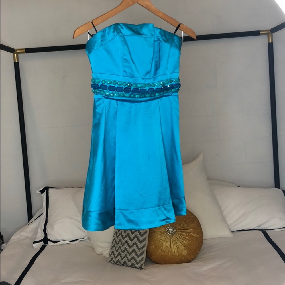 Summer ready turquoise, strapless Bebe dress